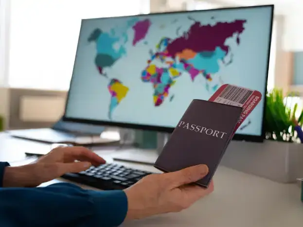 Holding multiple passports ready for travel